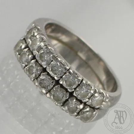 Timanttisormus 14xn.0.11ct, koko 16¼, 585 ja 750 valkokulta, paino 9,6g