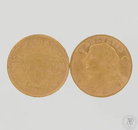 Kaksi kultarahaa, Sveitsi, 20 frangia, vuodelta 1935, 900, paino 12,9g