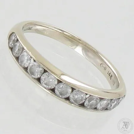 Timanttisormus 11xn.0,06ct, koko 17½, 585 valkokulta, paino 2,6g