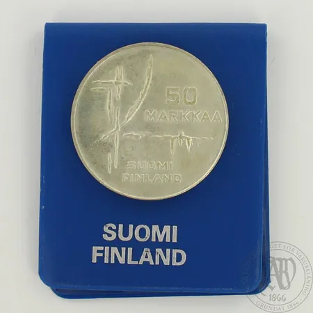 Juhlaraha, jääkiekon MM 1982, nimellisarvo 50mk, 500, paino 23,0g 
