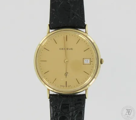 Kultarannekello Geneve Q, takakannessa kaiverrus, quartz: paristo loppunut, taulun Ø 33mm, 585br, paino 23,4g