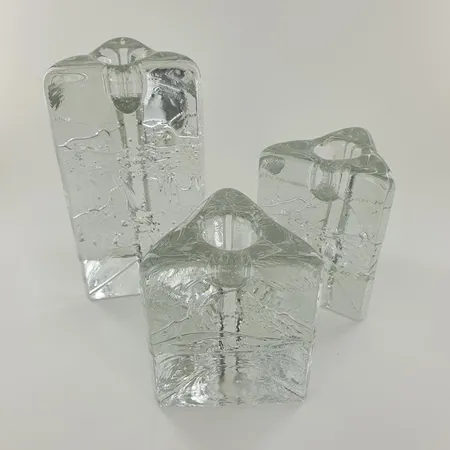 Kolme Iittala Arkipelago kynttilänjalkaa, kirkas, korkeudet 80-130mm, design Timo Sarpaneva   