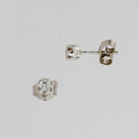 Timanttikorvakorut 2xn.0.10ct, 585 valkokulta, toinen tausta 750 valkokulta, paino 0,7g ja 0,1g  