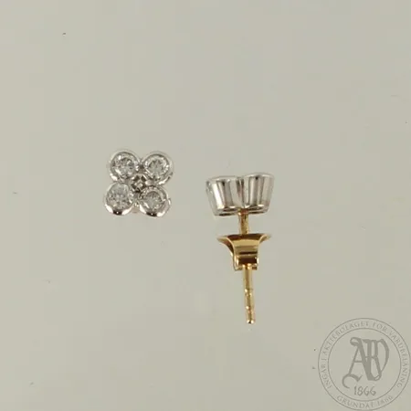Timanttikorvakorut 8xn.0.06ct, korkeus 7,5mm, 585 kelta- ja valkokulta, paino 2,0g