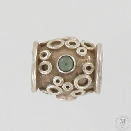 Koru sinisellä Topaasilla, Kalevala Koru, Lapsi-koru, korkeus ja leveys 10mm ja 14mm, 925br, paino 5,4g