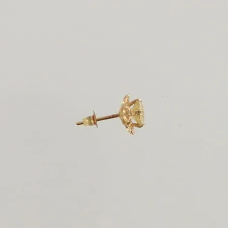 Yksi kivikorvakoru, Ø 8,2mm, 585br, paino 0,6g 