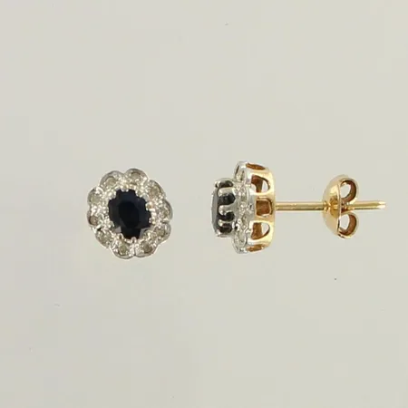 Kivikorvakorut timanteilla 20xn.0.005ct, korkeus 8,6mm, 585br, paino 1,9g 