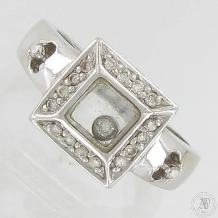 Timanttisormus 1xn.0.05ct, 8xn.0.02ct 16xn.0.005ct, koko 17, 750br valkokulta, paino 6,1g 