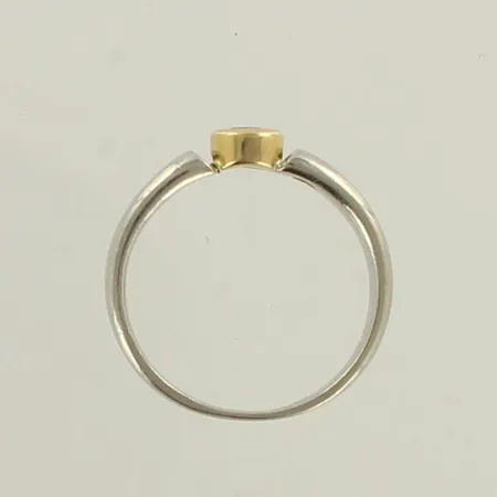 Timanttisormus 1xn.0.20ct, kaiverrettu, koko 17½, runko platina 950, kastikka 750 keltakulta, paino 6,1g 