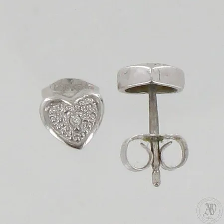 Timanttikorvakorut 2xn.0.005ct, Ø7mm, 585 valkokulta, paino 1,1g
