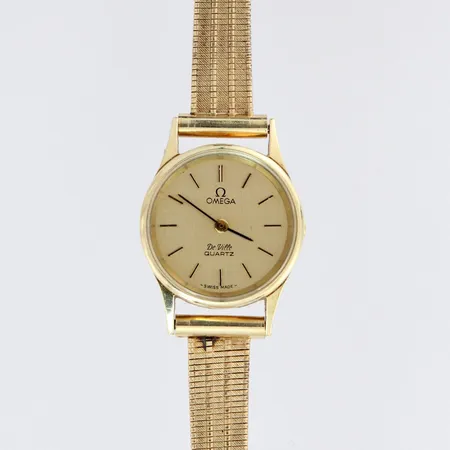 Kultarannekello Omega De Ville Quartz, taulun Ø 21mm, kaiverrettu, hihnan pituus 165mm, paristo luppu, 585br, paino 23,0g