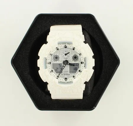 Rannekello Casio G-Shock, GA-100CG-7A, kellon rungon leveys 51,2 mm ja paksuus 17 mm,  LED -taustavalo, maailmanaika, ajastin, ajanotto, 5 hälytystä, torkku, tasatuntisignaali, ikuinen kalenteri, 200m vesitiivis ja 12/24h näyttö, uuden veroinen laatikko ja manuaali