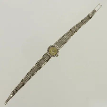 Timanttirannekello 18xn.0.01ct, Piaget, taulu hapettunut, mekaaninen, 17 kivinen, taulun Ø 16mm, ranneekkeen pituus 190mm, 750br valkokulta, paino 25,7g 