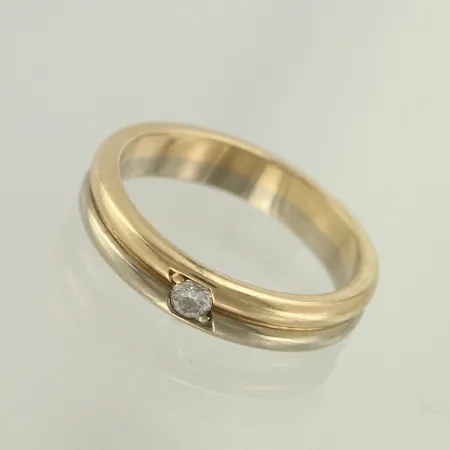 Timanttisormus 1xn.0.08ct, koko 16½, 585 valko- ja keltakulta, paino 4,3g 