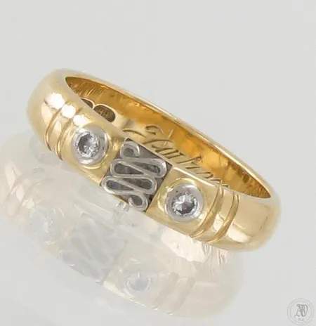Timanttisormus 2xn.0.02ct, kaiverrettu, koko 15, 750 kelta- ja valkokulta, paino 3,7g