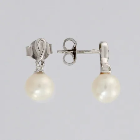 Helmikorvakorut timantilla 2xn.0.005ct, 585 valkokultaa, paino 1,8g