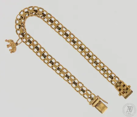 X-lenkkiranneketju riipuksella, lukko viallinen, pituus 200mm, leveys 8mm, 750, paino 17,8g