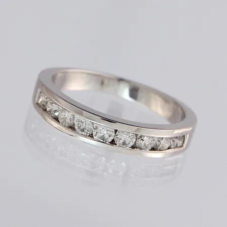 Timanttisormus 9xn.0.05ct, koko 16¾, 585 valkokulta, paino 3,2g