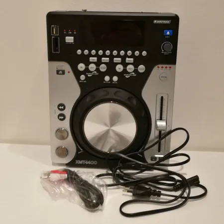 DJ-cd-soitin OMNITRONIC XMT-1400, RCA-piuha, ostokuitti 10.9.2019 Lähetetään postipakettina.