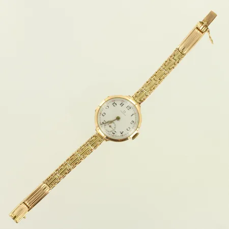 Kultarannekello Omega, mekaaninen, rannekeen pituus 160mm, 1 lisäpala 10mm, lasissa naarmuja, kellon Ø 26,7mm,  säätönuppi ei alkuperäinen, 583br, paino 32,7g 