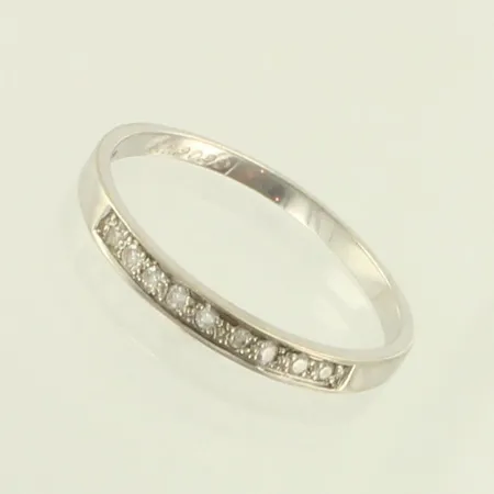 Timanttisormus 9xn.0.01ct, koko 18¾, kaiverrettu, 585 valkokulta, paino 1,7g