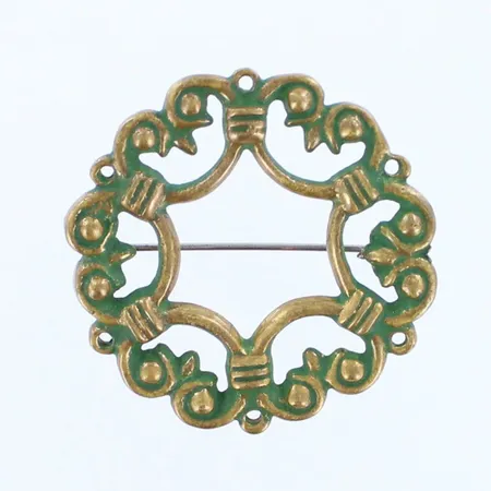 Rintakoru Kalevala Koru, Suotniemen solki, Ø 37mm, pronssi