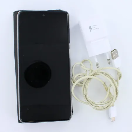 Kännykkä Samsung Galaxy A71, 128Gb , suojakuori, käytön jälkiä,  laturi, viallinen usb-piuha Lähetetään postipakettina.
