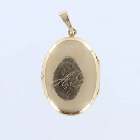 Medaljonki, kaiverrettu, korkeus 31mm, leveys 17mm, 585br, paino 2,4g 