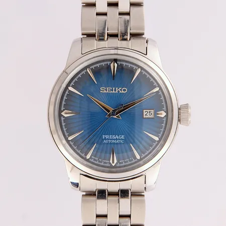 Teräsrannekello, Seiko, Presage Blue Cocktail, Automaatti, ref.SRPB41J1, taulun Ø 40mm, rannekkeen pituus 170mm, mukana kuusi jatkopalaa ja laatikko Lähetetään postipakettina.