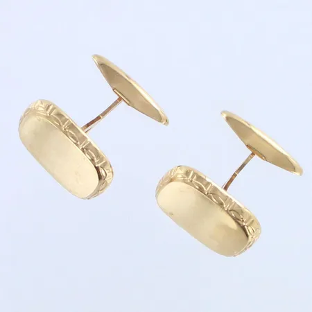 Kalvosinnapit, kaiverrettu, mitat 15,2x19,2mm, 585br, paino 5,9g 
