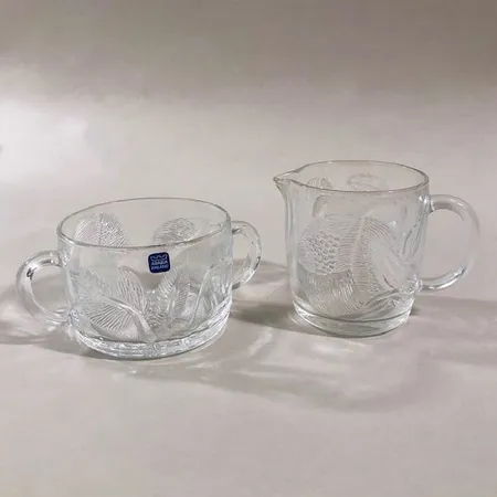 Sokerikko ja kermakko, Pioni - Nuutajärvi, korkeus 60-80mm, design Oiva Toikka.  Lähetetään postipakettina.