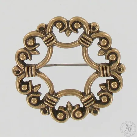 Rintakoru Kalevala Koru, Suotniemen solki, Ø 37mm, pronssi