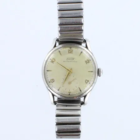 Teräsrannekello Tissot, automaatti, taulun Ø 34,5mm, rannekkeen pituus 185mm, käytön jälkiä ja lasissa naarmuja