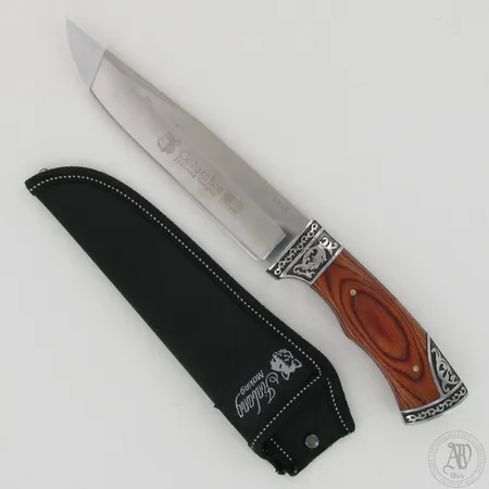 Veitsi Columbia SA58, pituus 31cm ja tuppi. 