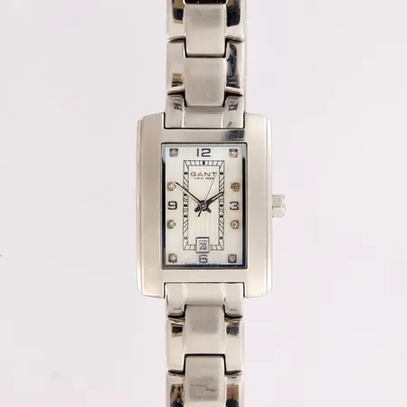 Teräsrannekello Gant helmiästaululla, quartz, taulun mitat 24x29mm, hihnan pituus 165mm, kaksi lisäpalaa ja laatikko.