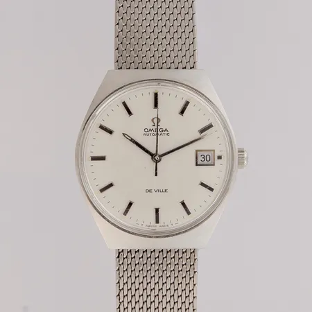 Teräsrannekello, Omega De Ville Automatic, Ref. 166 051, taulun Ø 34mm, päivyri, rannekkeen pituus 210mm (ranneke ei alkuperäinen), pleksissä normaalia käytön jälkeä, vuodelta 1969