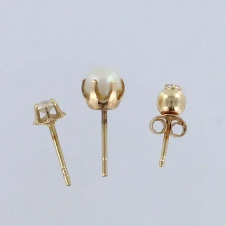 Kolme kivikorvakorua, kahden taustat puuttuu, korkeudet 4-6mm, Paino: 0,8g