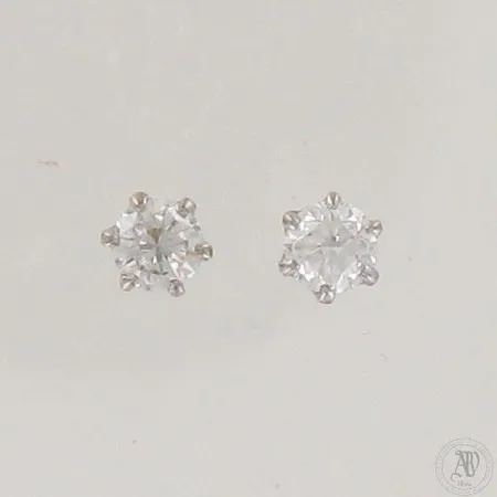 Timanttikorvakorut 2xn.0.25ct, korkeus 4mm, toinen tausta ei kultaa, 585 valkokulta,  Paino: 1 g