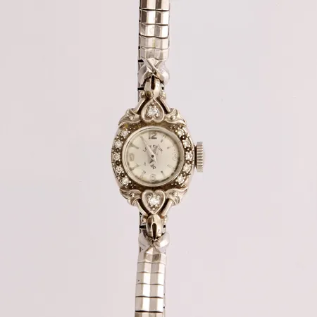 Kultarannekello timanteilla 2xn.0.02ct 10xn.0.01ct, Lady Elgin, manuaali, Ø 15mm, 585br valkokulta, ranneke metallia
