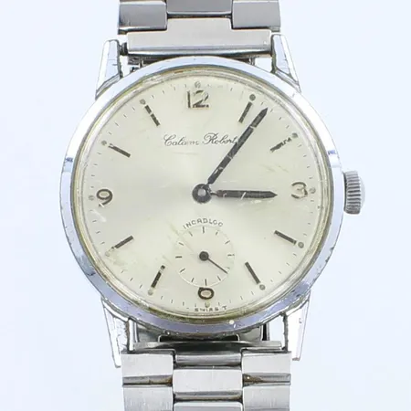 Teräsrannekello Calane Robert, lasi viallinen, taulun 34mm, rannekkeen pituus 190mm, ranneke ei alkuperäinen ja käytön jälkiä, mekaaninen