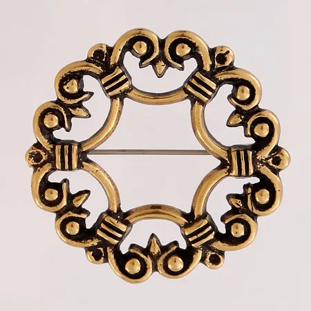 Rintakoru Kalevala Koru, Suotniemen solki, Ø 37mm, pronssi