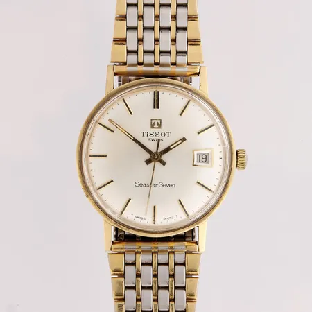 Kultarannekello, Tissot Seastar-Seven, mekaaninen,  taulun Ø33mm, pleksilasissa kulumaa ja jälkiä, kaiverrettu, ranneke ei alkuperäinen, rannekeen pituus 195mm, 585br,