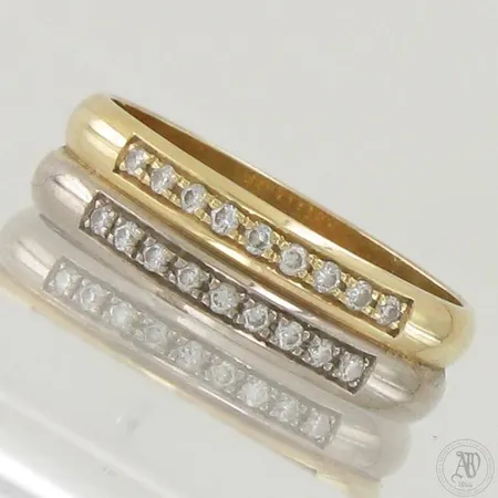 Timanttisormus 18xn.0.01ct, koko 18, 585 valko- ja keltakulta,  Paino: 4,1 g