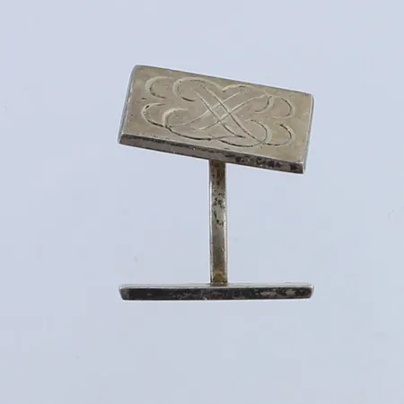 Kalvosinnappi, kaiverrettu, mitat 17x11mm, 813h,  Paino: 5 g