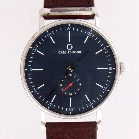 Teräsrannekello, Carl Edmond Ryolit, rungon Ø40mm, quartz, laatikko ja takuutodistus,