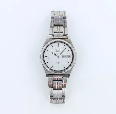 Teräsrannekello Seiko, 7009-876A, taulun Ø 38mm, automaatti, käytön jälkiä ja lasi rikki, rannekkeen pituus 20cm