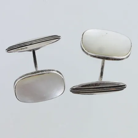 Kalvosinnapit kivillä, korkeus 16mm, 813br,  Paino: 7,4 g
