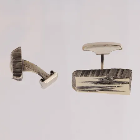 Kalvosinnapit, vuodelta 1978, kuvioleimalla (Sten & Laine, Finfeelings Oy) koko 25x13mm, 925 Paino: 13,3 g