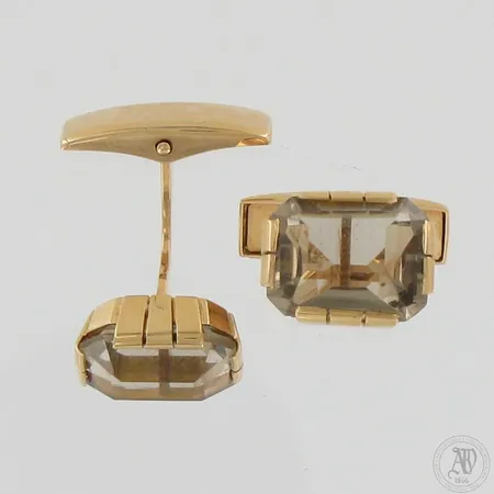 Kivikalvosinnapit, kaiverrettu ja käytön jälkiä, mitat 9x11mm, 585br,  Paino: 8,6 g
