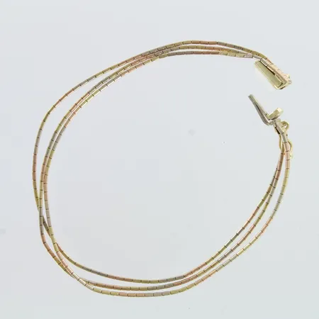 Rannekoru, käytön jälkiä, pituus 180mm, 585 valko-, puna- ja keltakulta,  Paino: 9,1 g